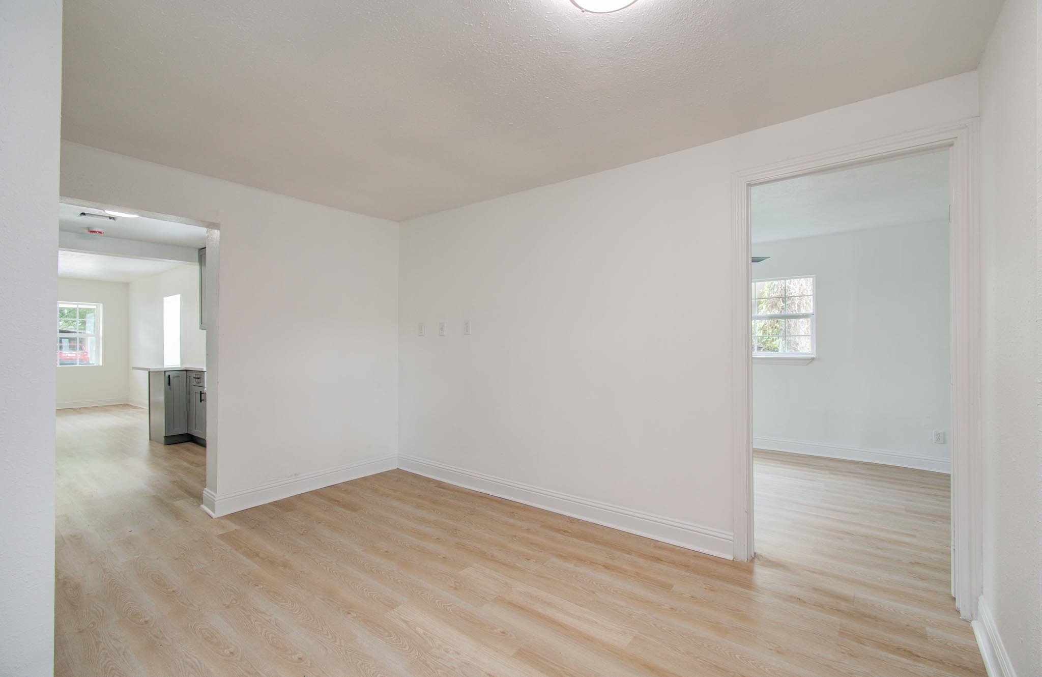 10309 Wiggins Street Houston, TX 77029 - Photo 12 of 32 wooden floor in an empty room