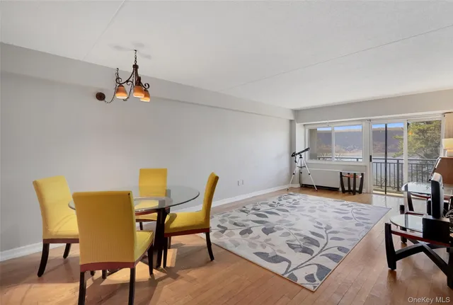 a living room with a couch and dresser