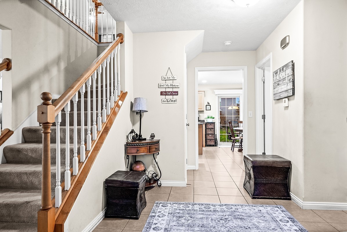 2985 Bear Claw Street Normal, IL 61761 - Photo 11 of 51 a view of a hallway with wooden floor and windows
