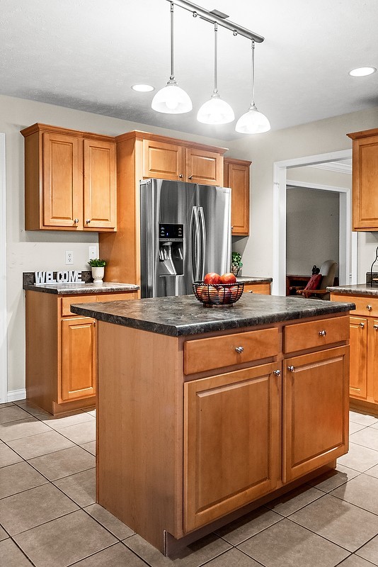 2985 Bear Claw Street Normal, IL 61761 - Photo 17 of 51 a kitchen with granite countertop a sink and cabinets