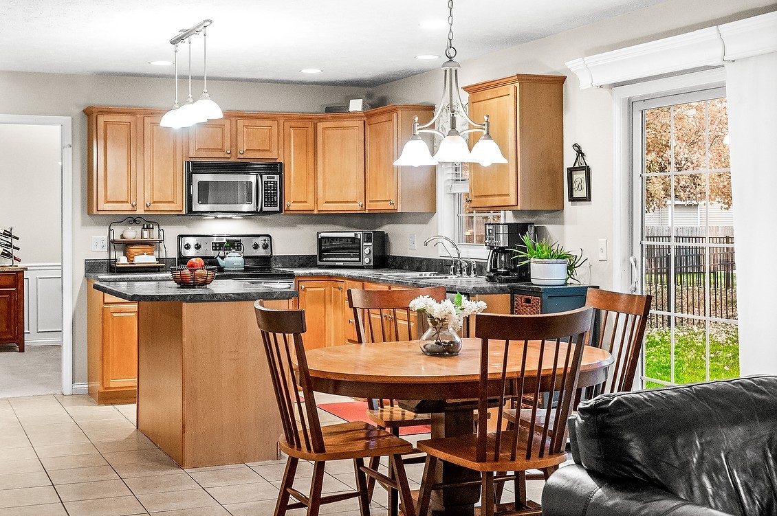 2985 Bear Claw Street Normal, IL 61761 - Photo 19 of 51 a view of a dining room with furniture window and outside view