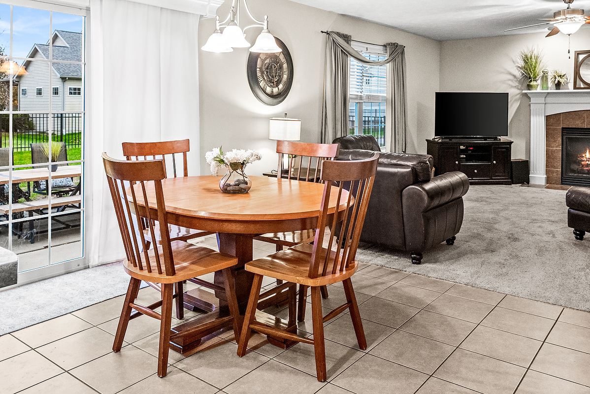 2985 Bear Claw Street Normal, IL 61761 - Photo 21 of 51 a view of a dining room with furniture