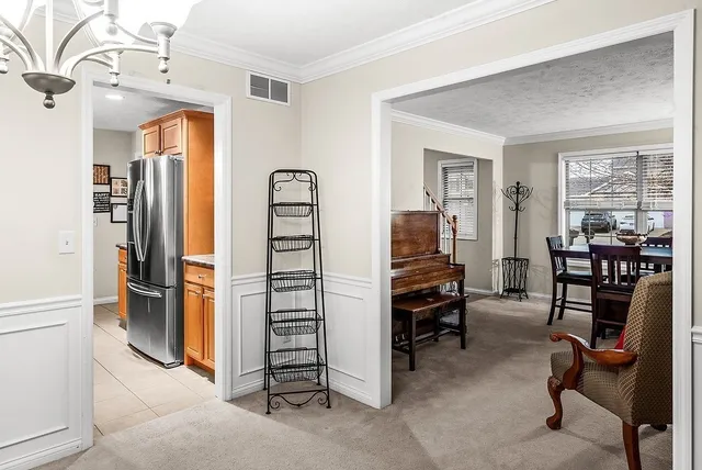 a view of a livingroom with furniture and windows