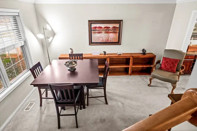 a view of a dining room with furniture