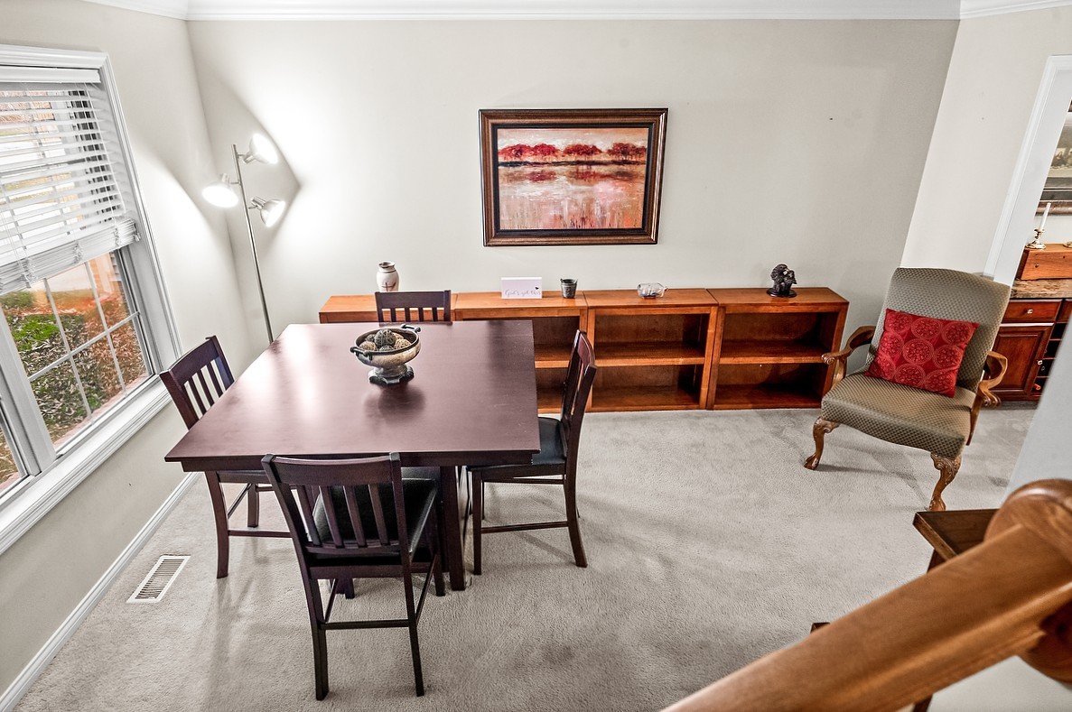 2985 Bear Claw Street Normal, IL 61761 - Photo 30 of 51 a view of a dining room with furniture