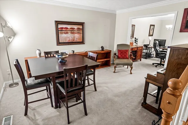 a view of a livingroom and dining room
