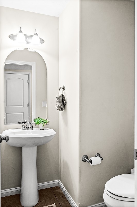 2985 Bear Claw Street Normal, IL 61761 - Photo 32 of 51 a bathroom with a sink mirror and toilet