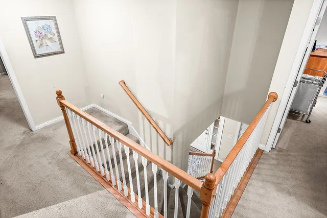 a bedroom with a bed and dresser