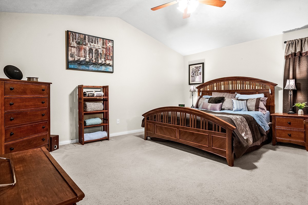 2985 Bear Claw Street Normal, IL 61761 - Photo 36 of 51 a bedroom with a bed and dresser