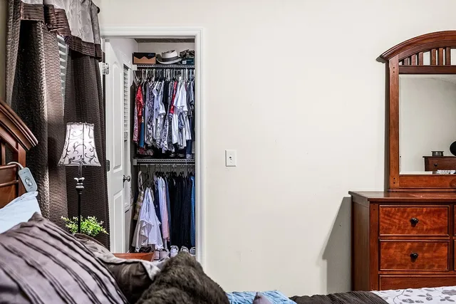 a bathroom with a sink double vanity and mirror