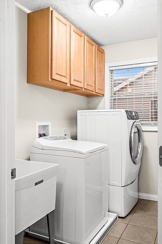 2985 Bear Claw Street Normal, IL 61761 - Photo 47 of 51 a utility room with dryer and washer