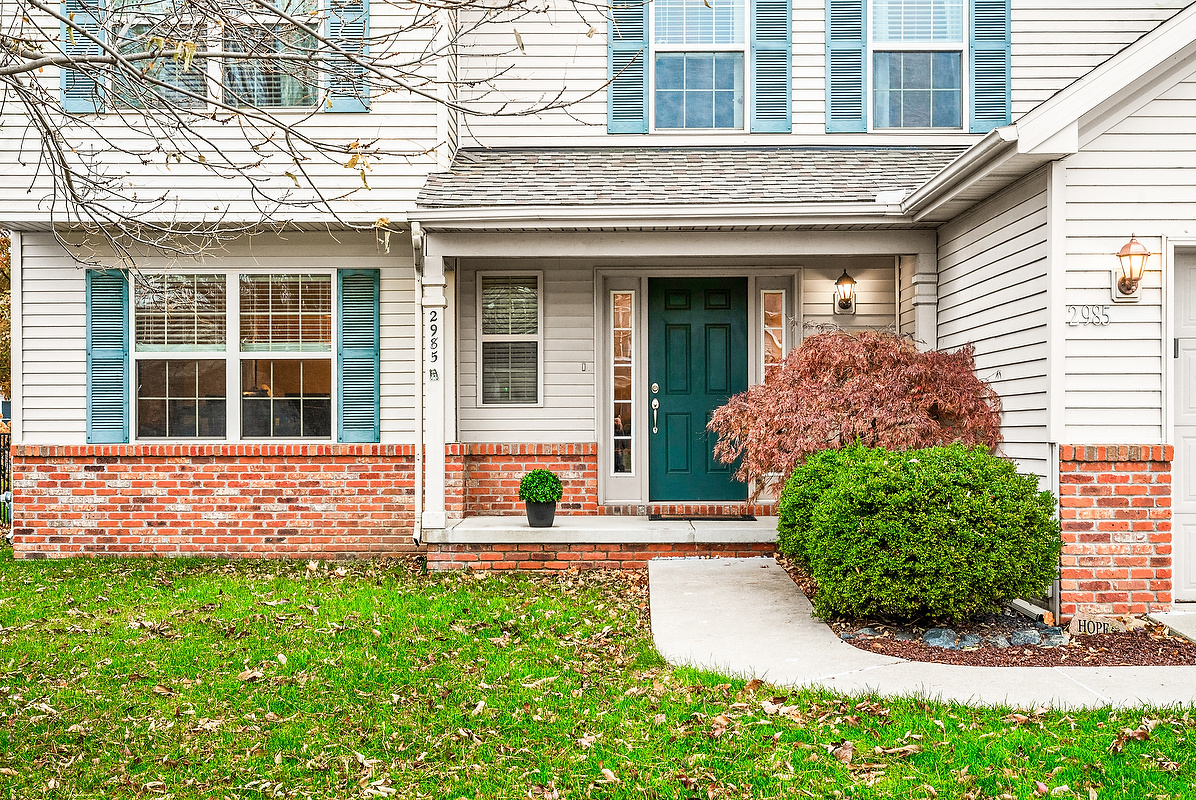 2985 Bear Claw Street Normal, IL 61761 - Photo 5 of 51 a front view of a house with garden