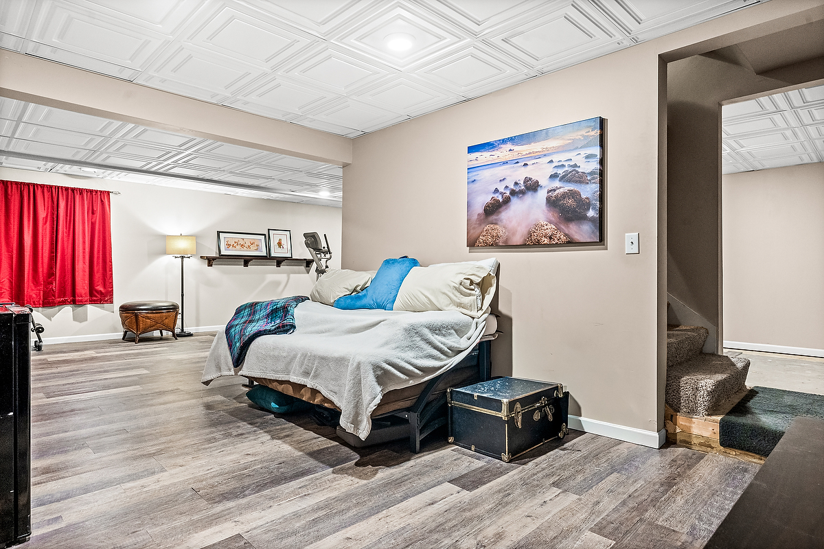 2985 Bear Claw Street Normal, IL 61761 - Photo 51 of 51 a bedroom with bed and a couch