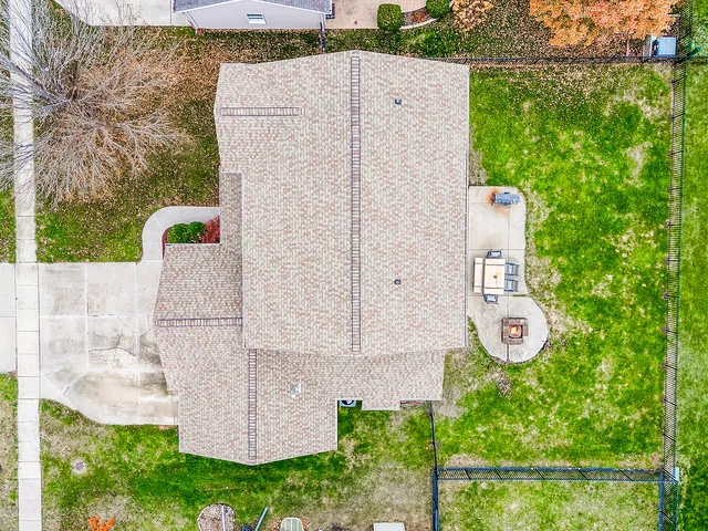 an aerial view of a house with garden