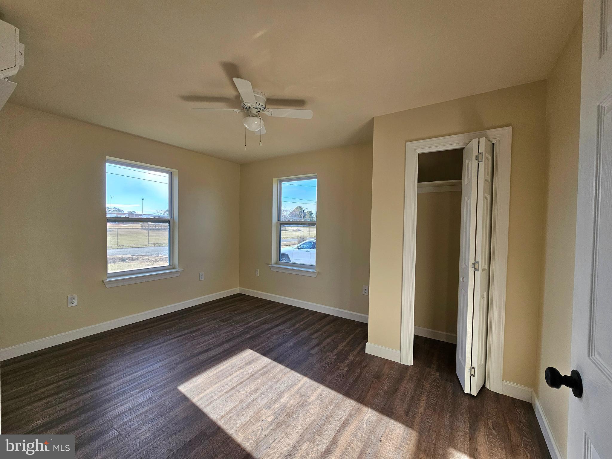 26404 Franklin Road Crisfield, MD 21817 - Photo 9 of 31 a view of an empty room window and wooden floor