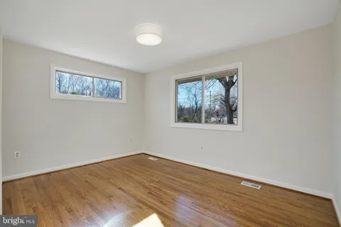 a kitchen with stainless steel appliances a stove a sink and a refrigerator