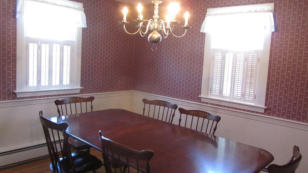 2 Bertha Street Hudson, MA 01749 - Photo 11 of 17 a view of a dining room with furniture window and outside view