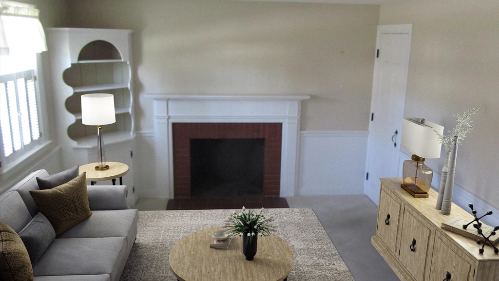 2 Bertha Street Hudson, MA 01749 - Photo 9 of 17 a living room with furniture and a fireplace
