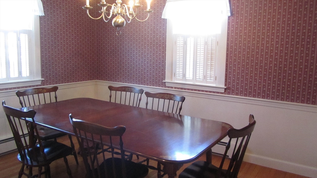 2 Bertha Street Hudson, MA 01749 - Photo 10 of 17 a view of a dining room with furniture and window