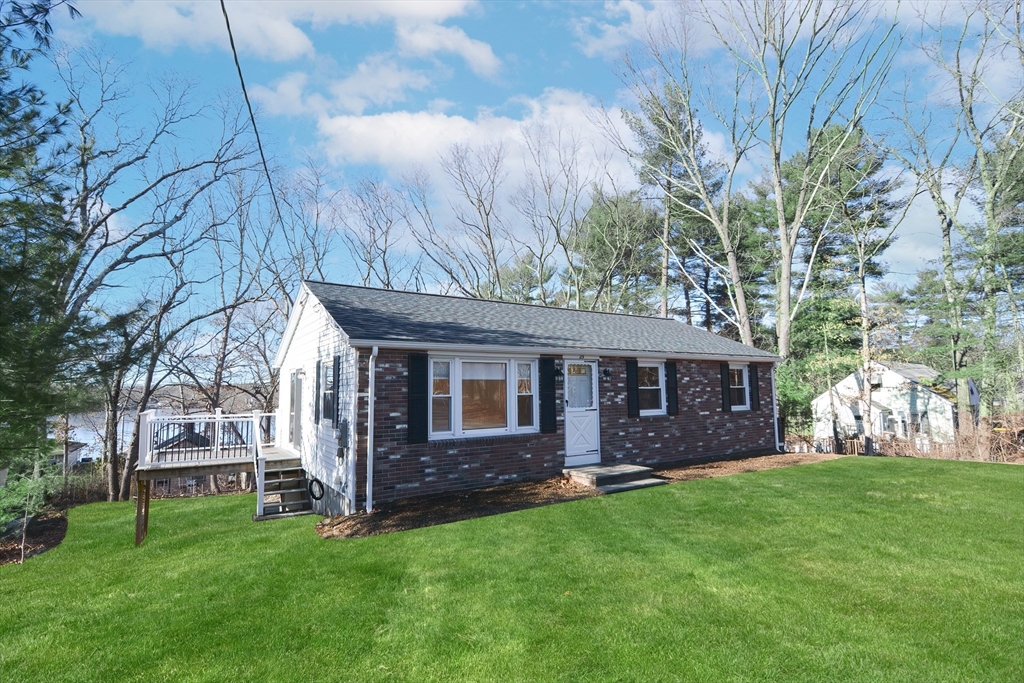 25 Indian Run Road Bellingham, MA 02019 - Photo 2 of 29 a view of a house with a yard and sitting area