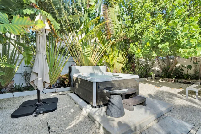 a view of backyard with a patio and entertaining space