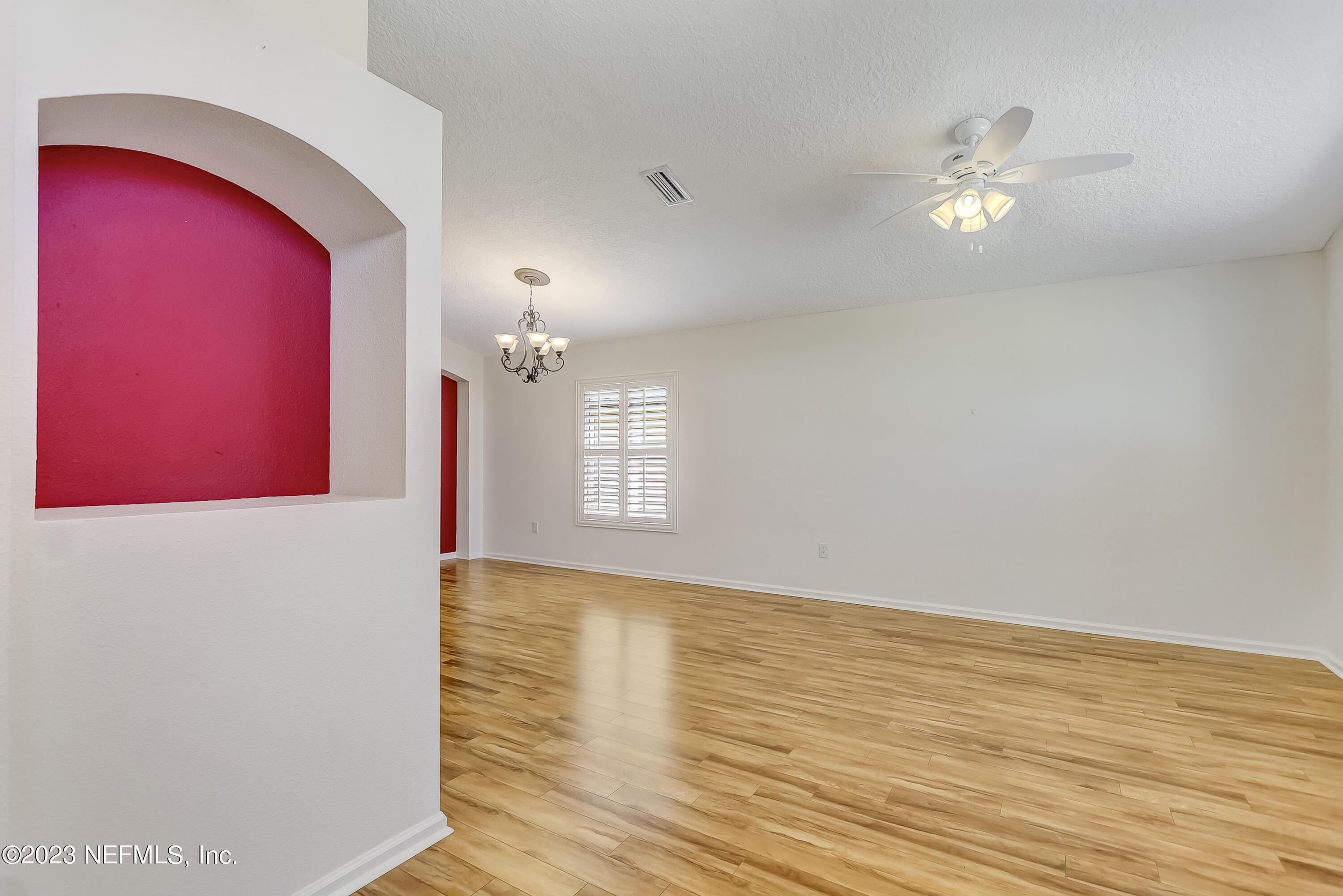 608 Birchbark Trail St. Augustine, FL 32092 - Photo 5 of 42 a view of a livingroom with wooden floor