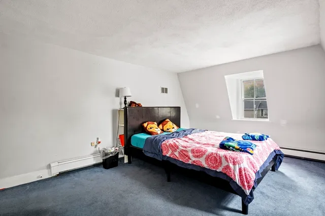 a bathroom with a sink a mirror and a toilet