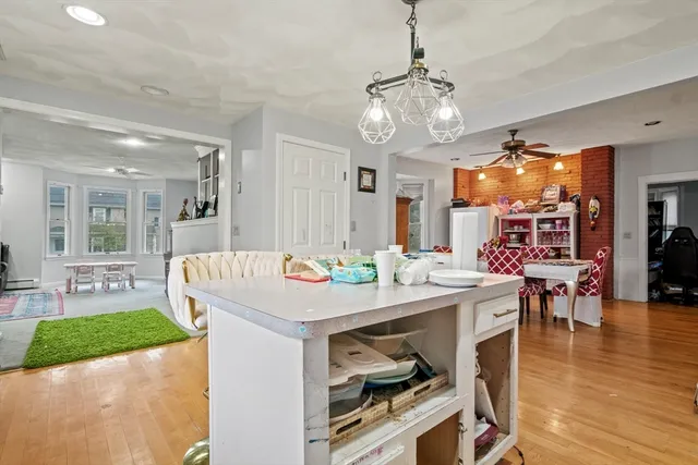 a view of a kitchen and dining area