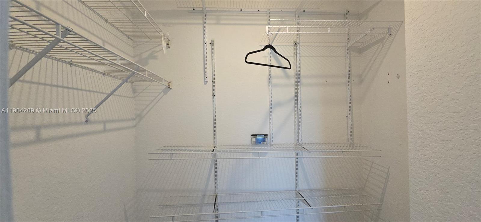 21000 Southwest 87th Avenue, Unit 308 Cutler Bay, FL 33189 - Photo 21 of 30 a bathroom with a shower