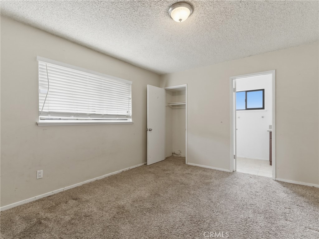 10127 Foothill Boulevard Sylmar, CA 91342 - Photo 15 of 33 an empty room with windows