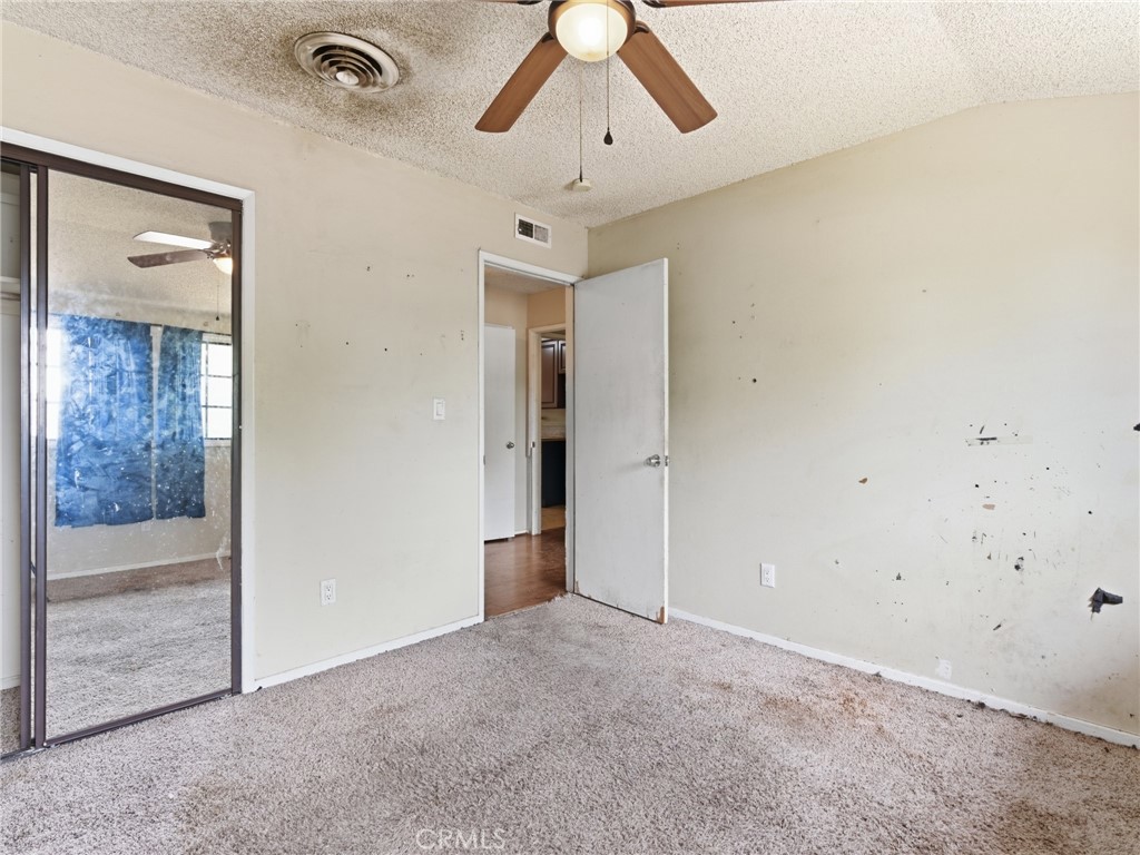 10127 Foothill Boulevard Sylmar, CA 91342 - Photo 21 of 33 a view of a chandelier fan and entryway