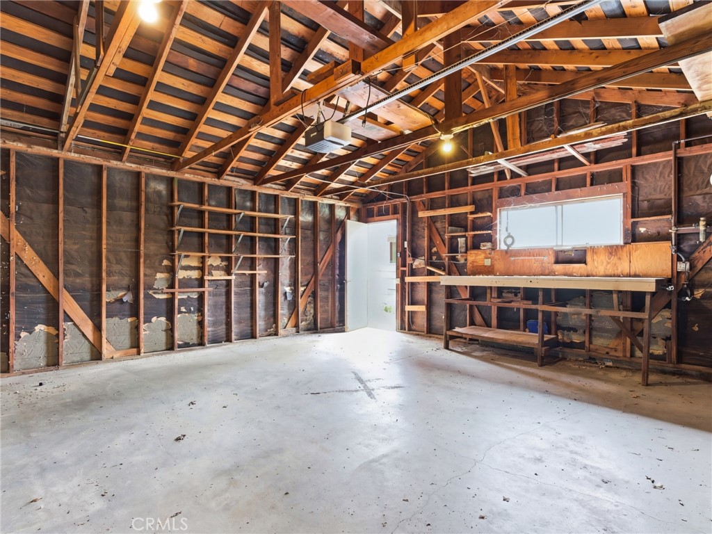 10127 Foothill Boulevard Sylmar, CA 91342 - Photo 30 of 33 a view of a room with wooden walls