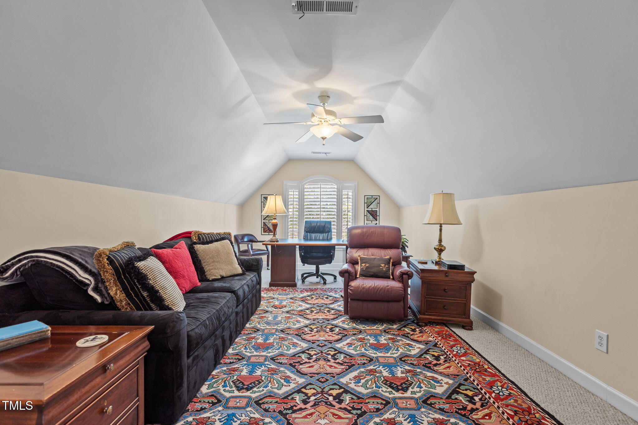 206 Nouveau Avenue Raleigh, NC 27615 - Photo 13 of 61 a living room with furniture rug and window