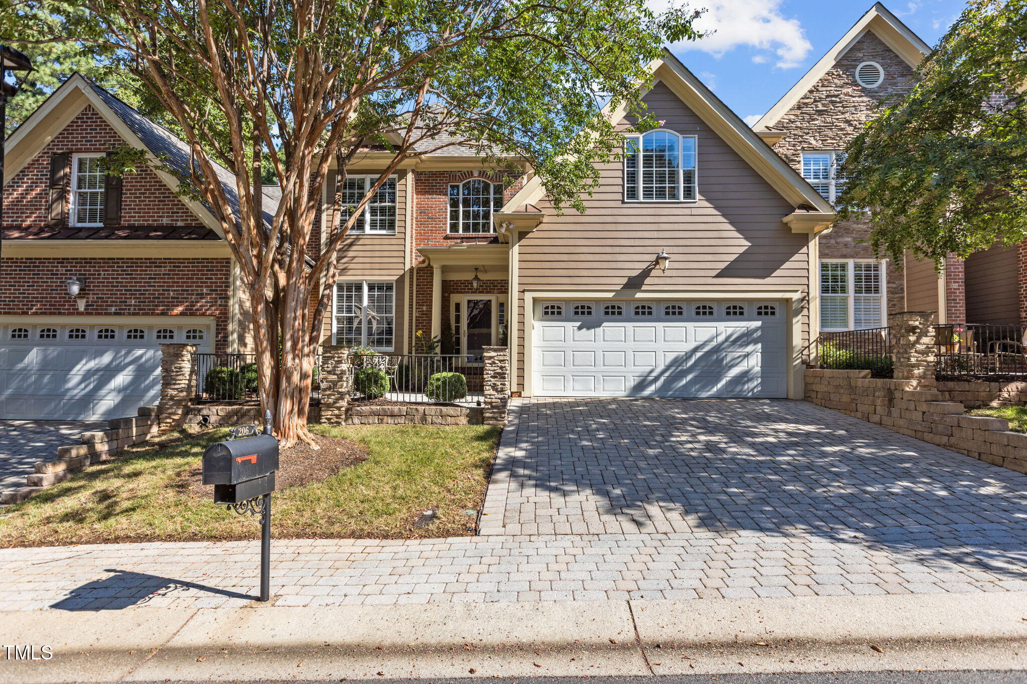206 Nouveau Avenue Raleigh, NC 27615 - Photo 2 of 61 a front view of a house with garden