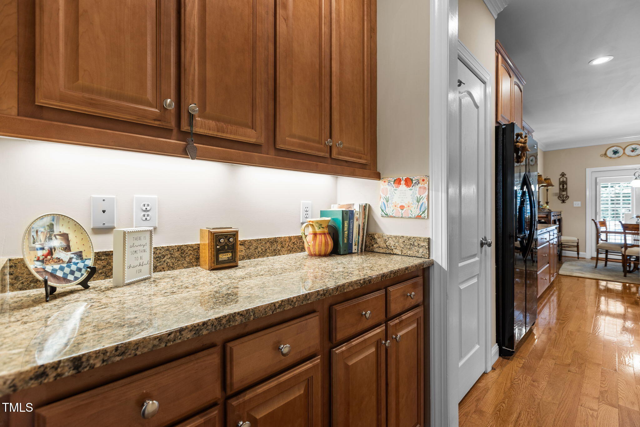 206 Nouveau Avenue Raleigh, NC 27615 - Photo 22 of 61 a kitchen with granite countertop stainless steel appliances and refrigerator