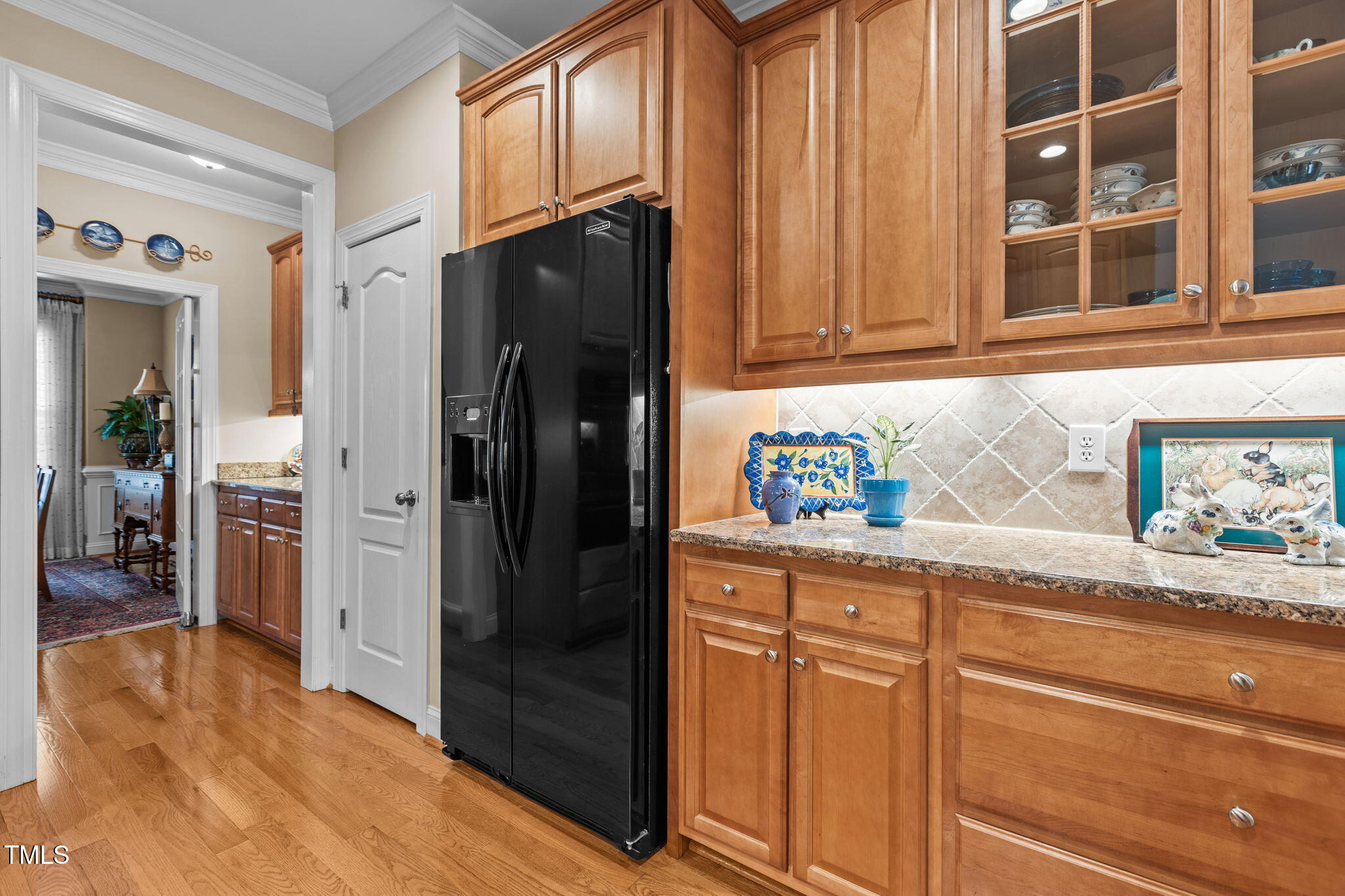 206 Nouveau Avenue Raleigh, NC 27615 - Photo 24 of 61 a kitchen with stainless steel appliances granite countertop a refrigerator and a sink