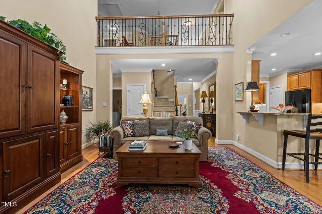 a bedroom with two beds and a large window