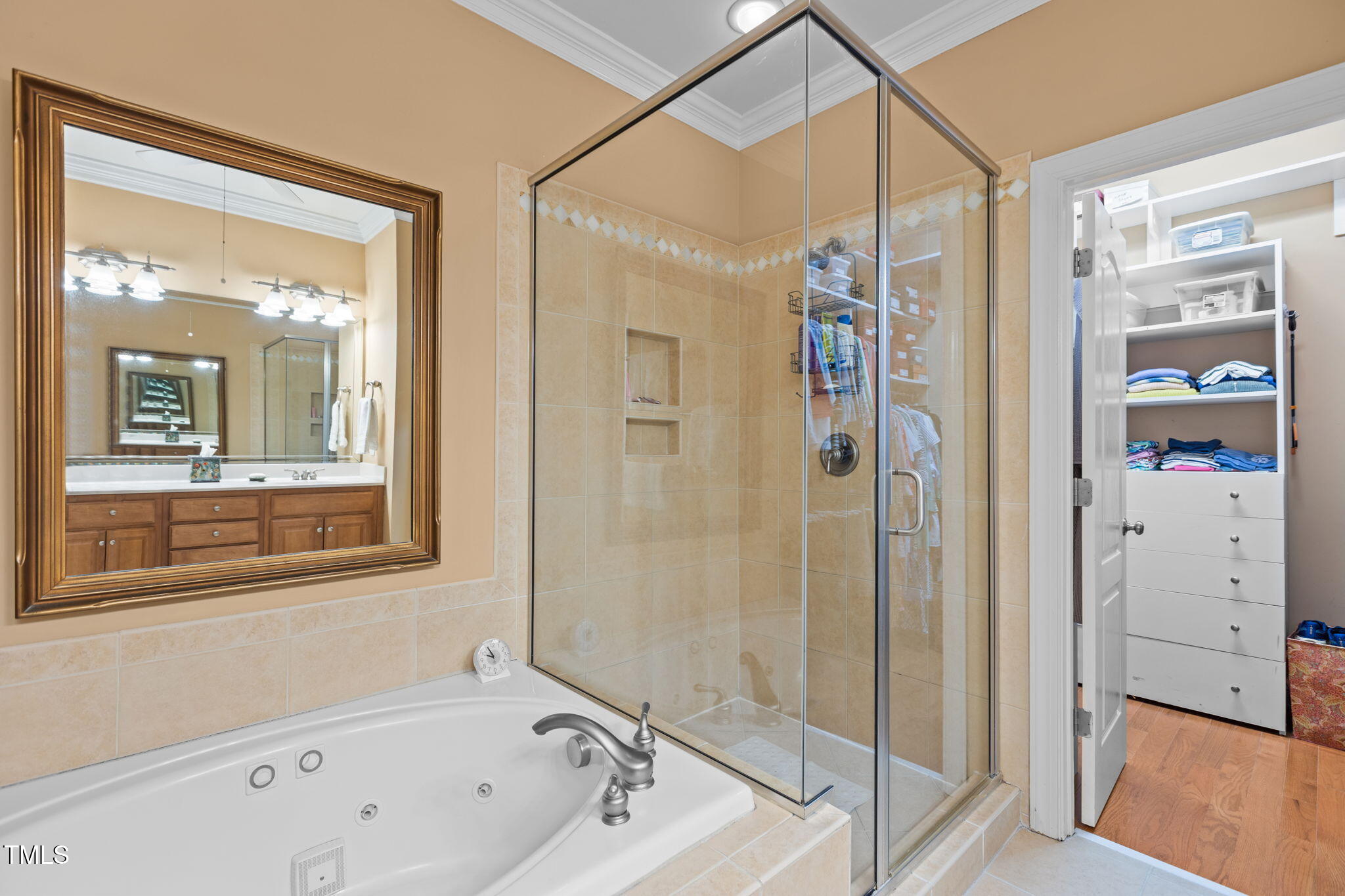 206 Nouveau Avenue Raleigh, NC 27615 - Photo 38 of 61 a bathroom with a bathtub and a shower