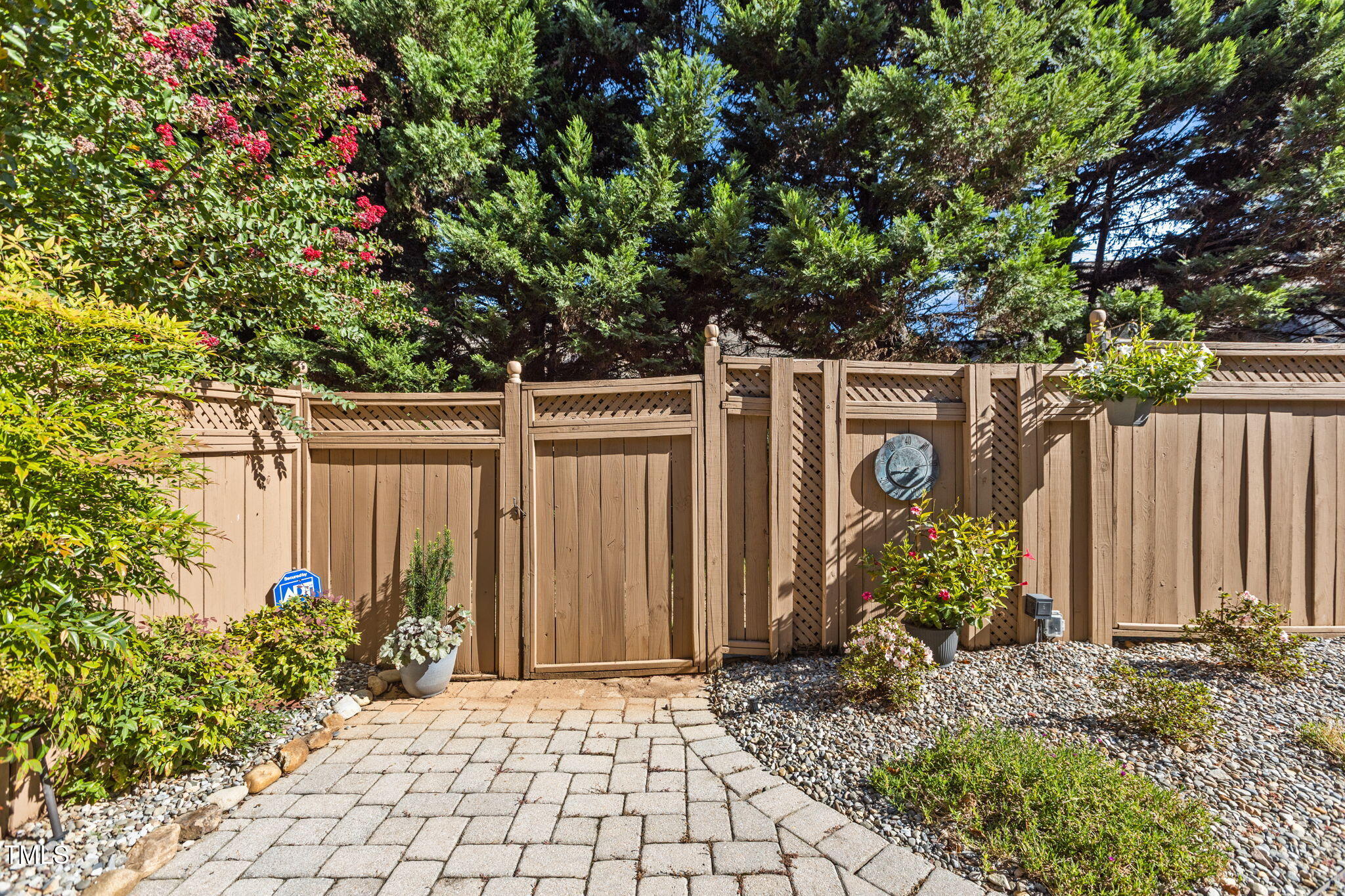 206 Nouveau Avenue Raleigh, NC 27615 - Photo 48 of 61 a front view of a house with garden