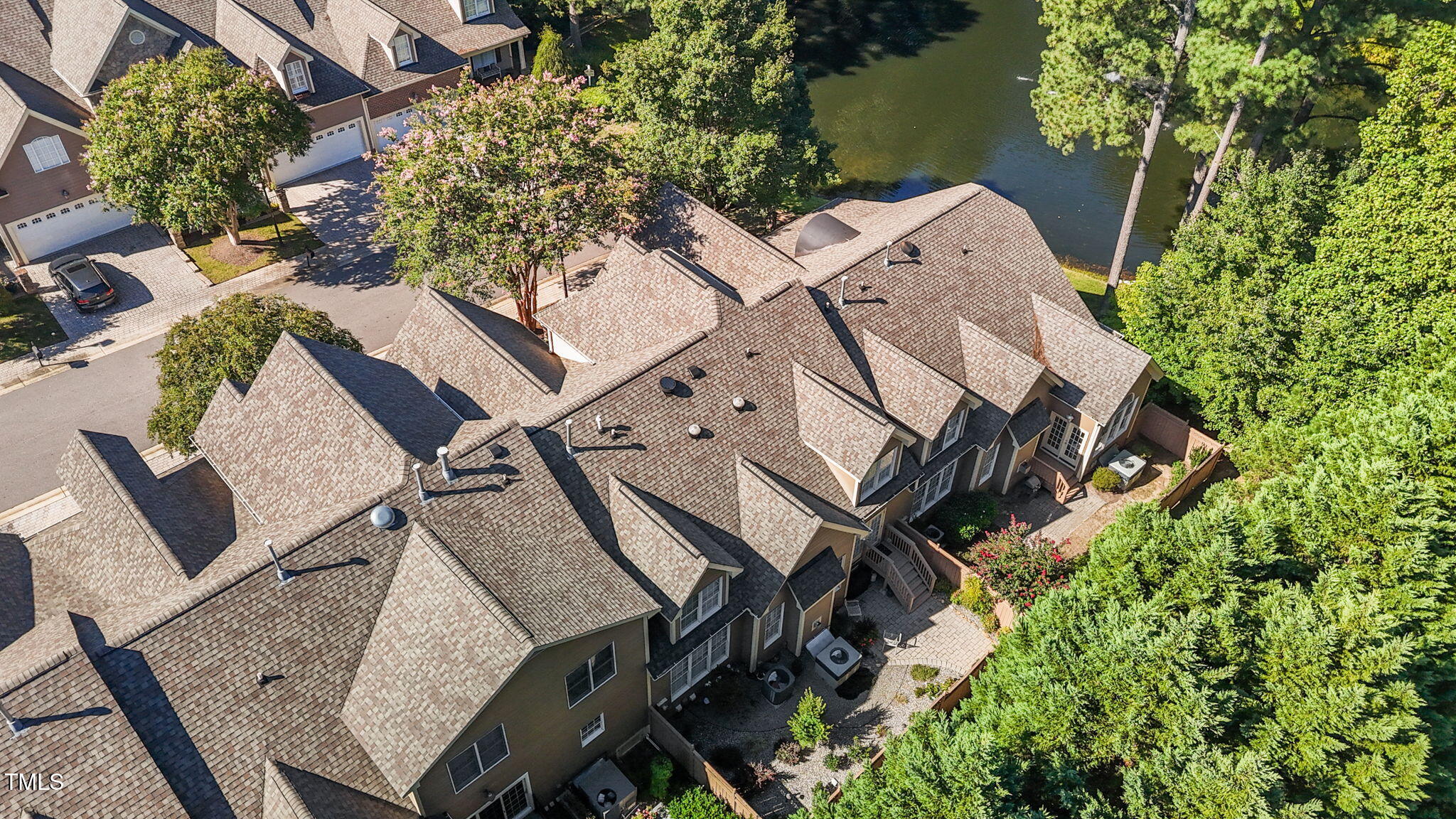 206 Nouveau Avenue Raleigh, NC 27615 - Photo 61 of 61 an aerial view of a house with outdoor space and lake view
