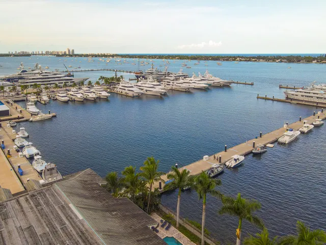 an aerial view of a city with ocean view