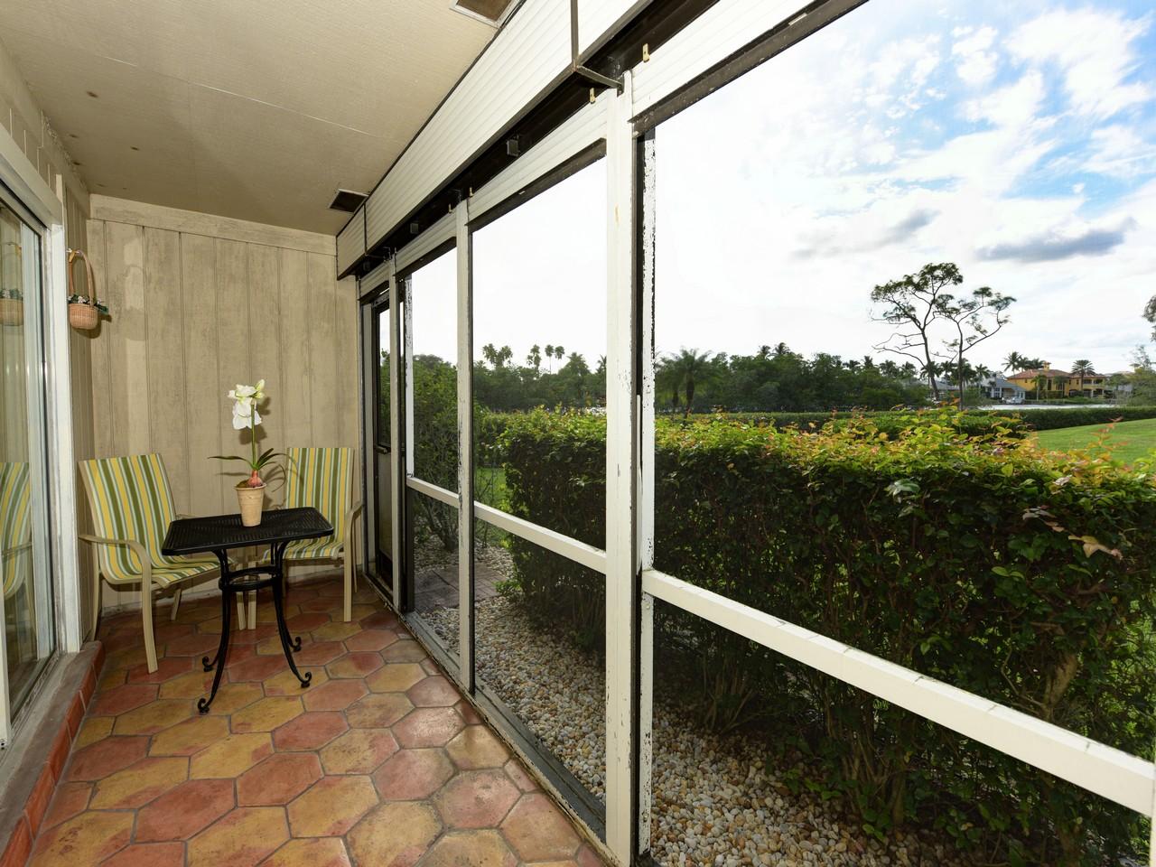 9170 Southeast Riverfront Terrace, Unit E Tequesta, FL 33469 - Photo 13 of 26 RB Porch 1