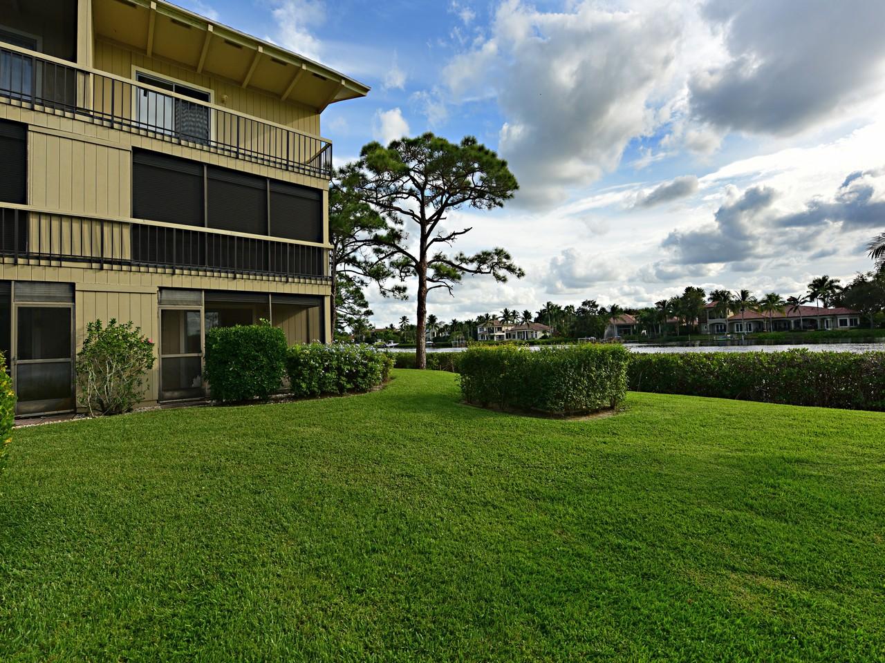 9170 Southeast Riverfront Terrace, Unit E Tequesta, FL 33469 - Photo 2 of 26 RB Back 2