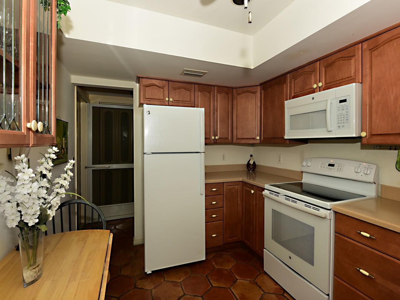 9170 Southeast Riverfront Terrace, Unit E Tequesta, FL 33469 - Photo 6 of 26 RB Kitchen 1