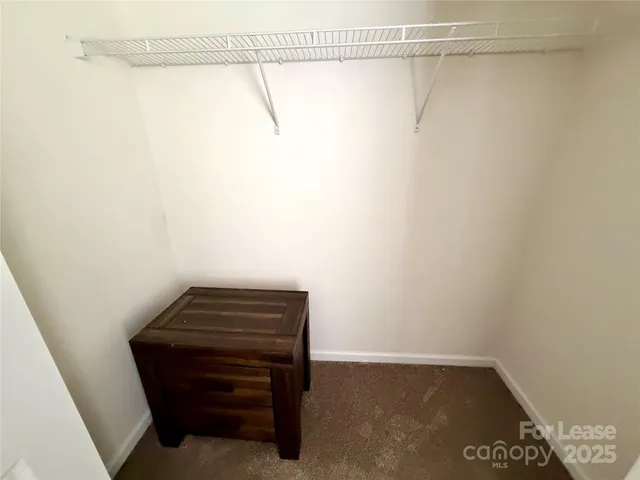 a view of a room with racks on the wall