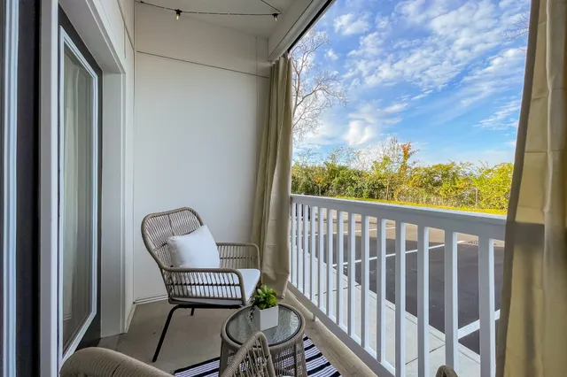 a view of a two chair in the balcony