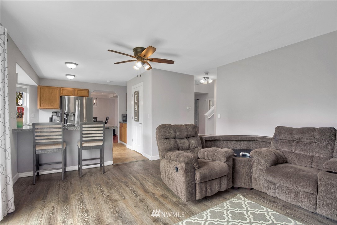2516 Harts Lake Road South Roy, WA 98580 - Photo 11 of 32 a living room with furniture and a wooden floor