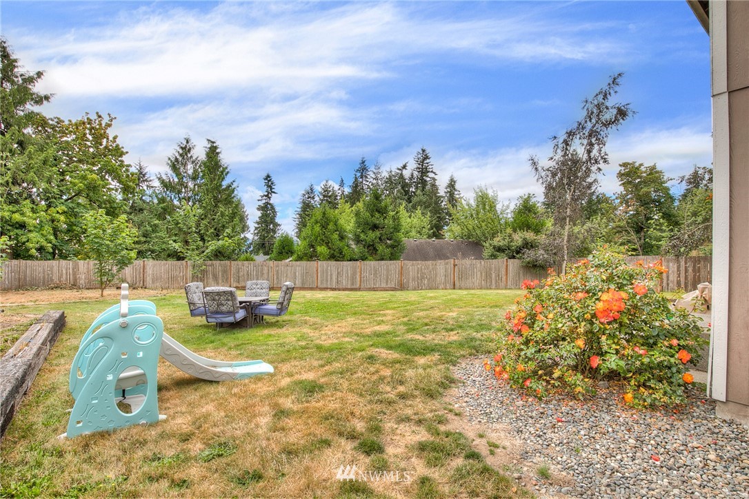 2516 Harts Lake Road South Roy, WA 98580 - Photo 24 of 32 a view of a swimming pool with a patio