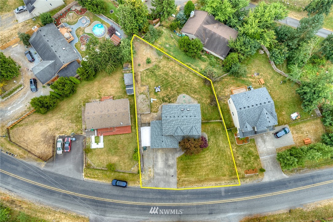 2516 Harts Lake Road South Roy, WA 98580 - Photo 27 of 32 an aerial view of residential houses with outdoor space