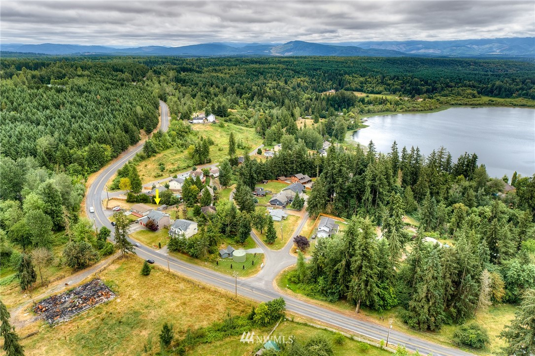2516 Harts Lake Road South Roy, WA 98580 - Photo 32 of 32 an aerial view of residential houses with outdoor space and trees all around